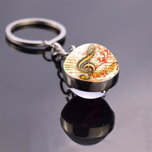 Load image into Gallery viewer, Music Notes Glass Ball Keychain