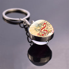 Load image into Gallery viewer, Music Notes Glass Ball Keychain